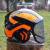 kask-protos-czarno-pomarańczowy-neon.png